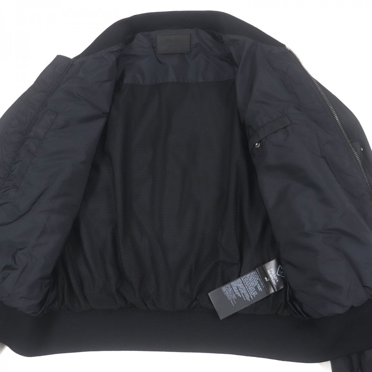 PRADA Bomber jacket SGC006 Outer: 100% polyamide (nylon), Part: 81% wool, Part: 17% polyamide (nylon), Part: 2% elastane (polyurethane), Sleeve lining: 100% polyamide (nylon) black mens S