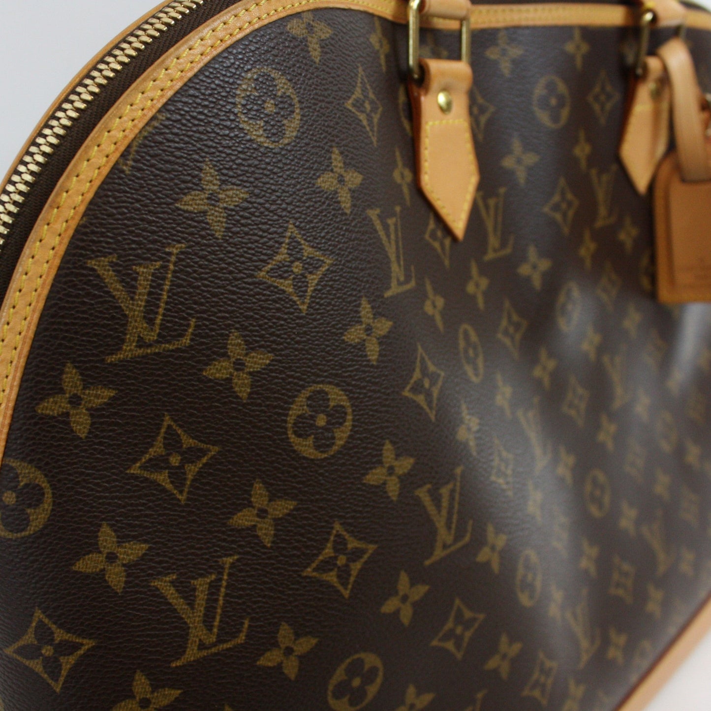 Louis Vuitton ALMA VOYAGE MONOGRAM