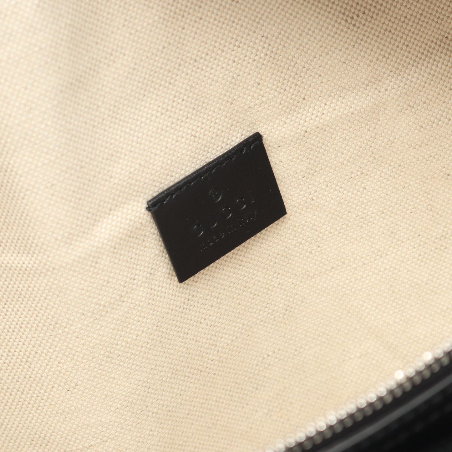 Gucci GG Embossed Leather Waist Bag