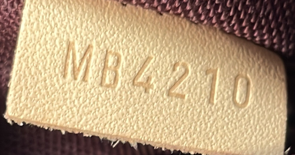 Louis Vuitton Rivoli Handbag Monogram Canvas MM