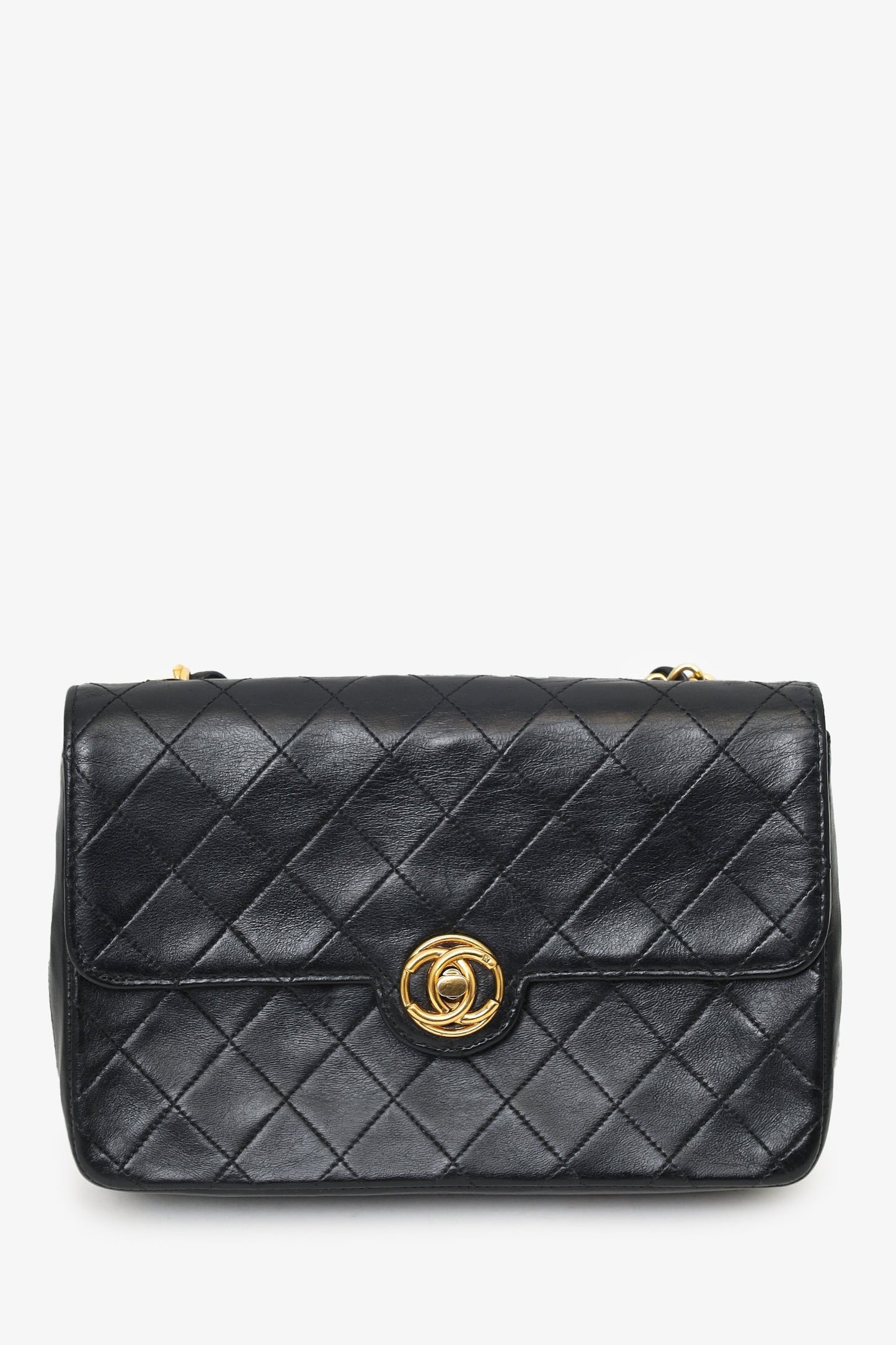 Chanel™ 1986-88 Black Quilted Lambskin Circle CC Mini Flap Bag