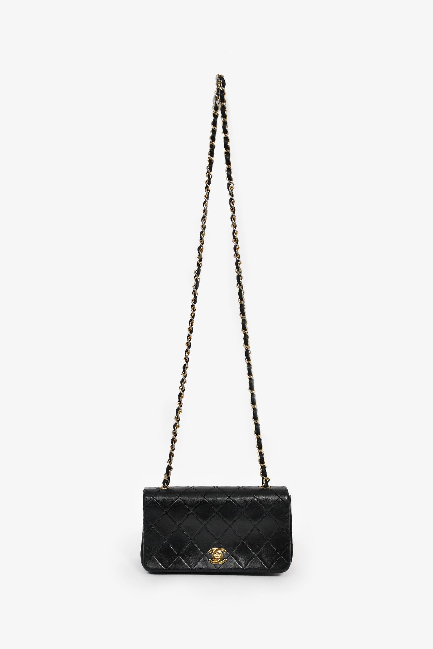 Chanel™ 1989-91 Black Quilted Lambskin Mini Rectangular Full Flap Bag