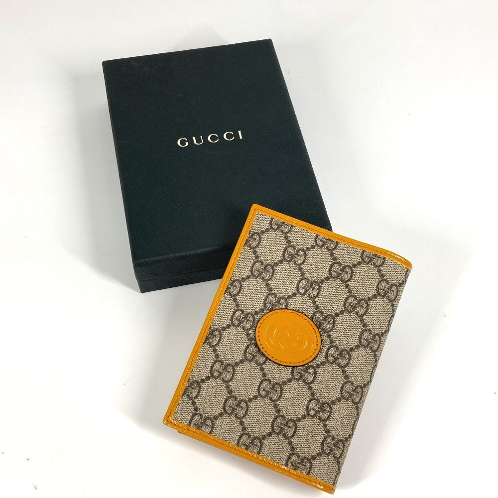 GUCCI passport case 724562 GG Supreme canvas, leather yellow GG Supreme RETRO logo