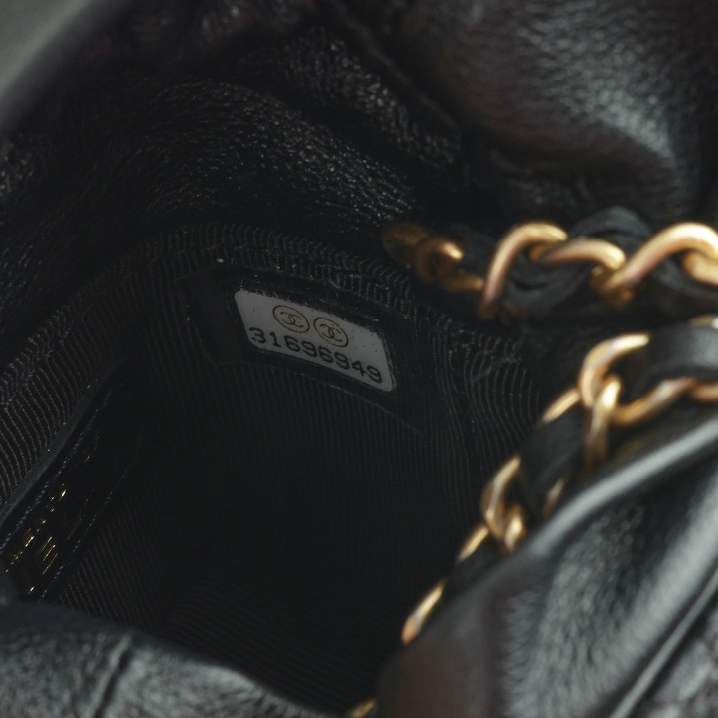 Chanel Micro Drawstring Bucket Bag - Black Lambskin | Aged Gold Hardware