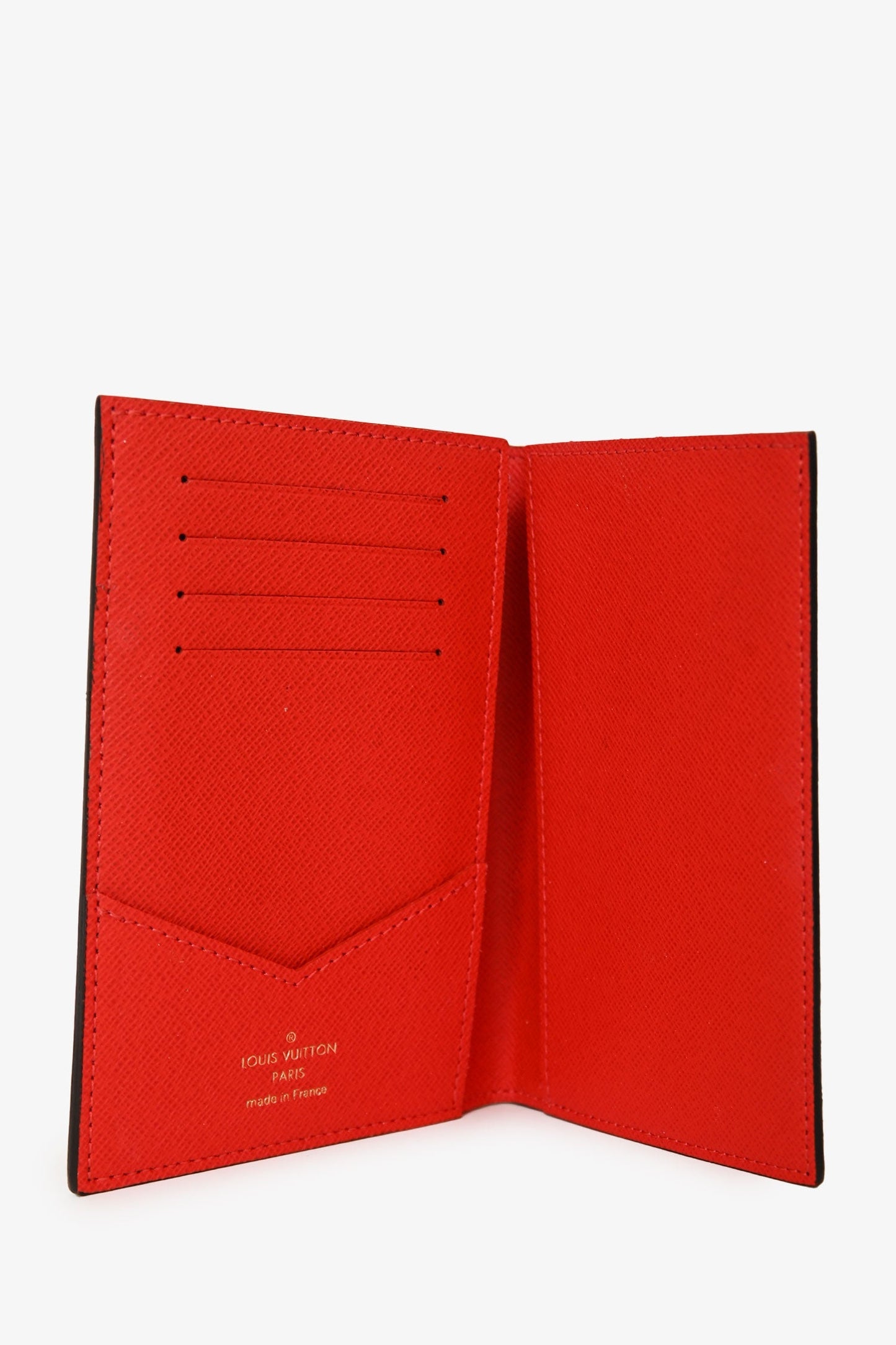 Louis Vuitton Monogram Coated Canvas Lion & Cheetah Passport Holder