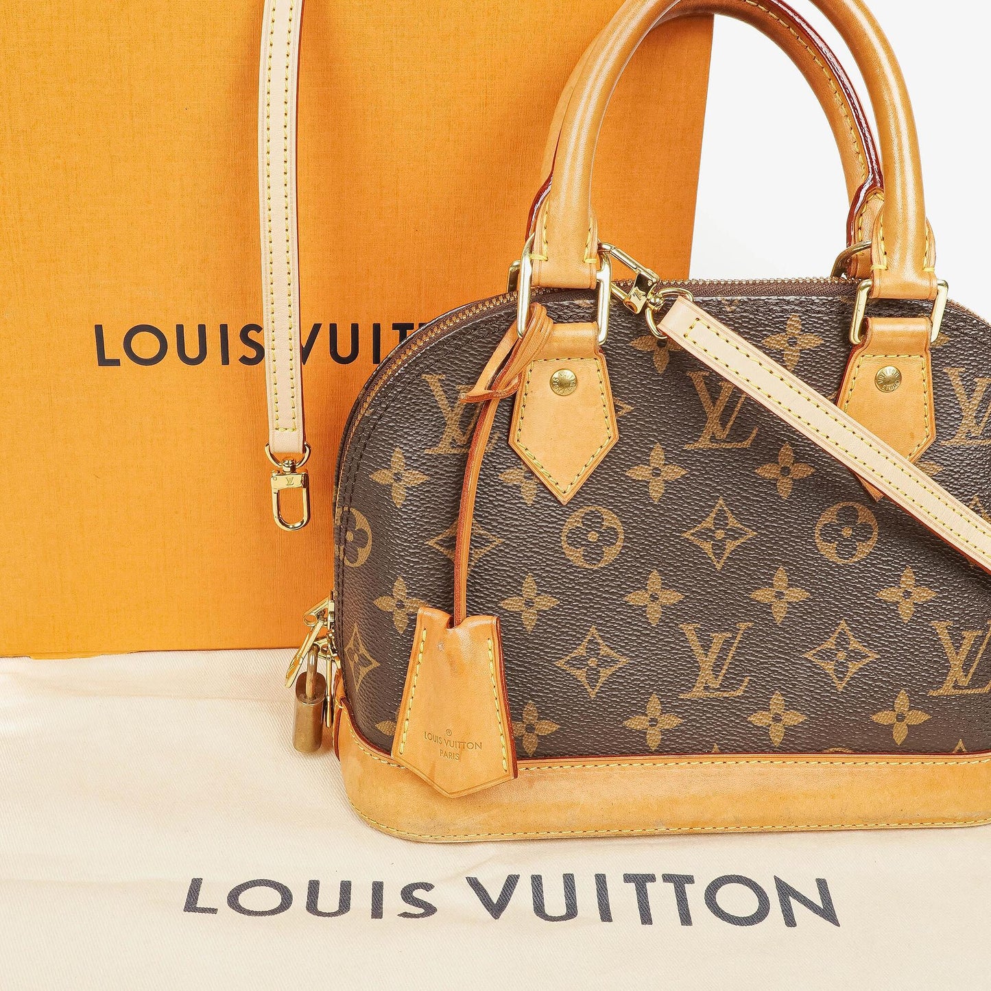 Louis Vuitton Alma BB Monogram Canvas Handbag