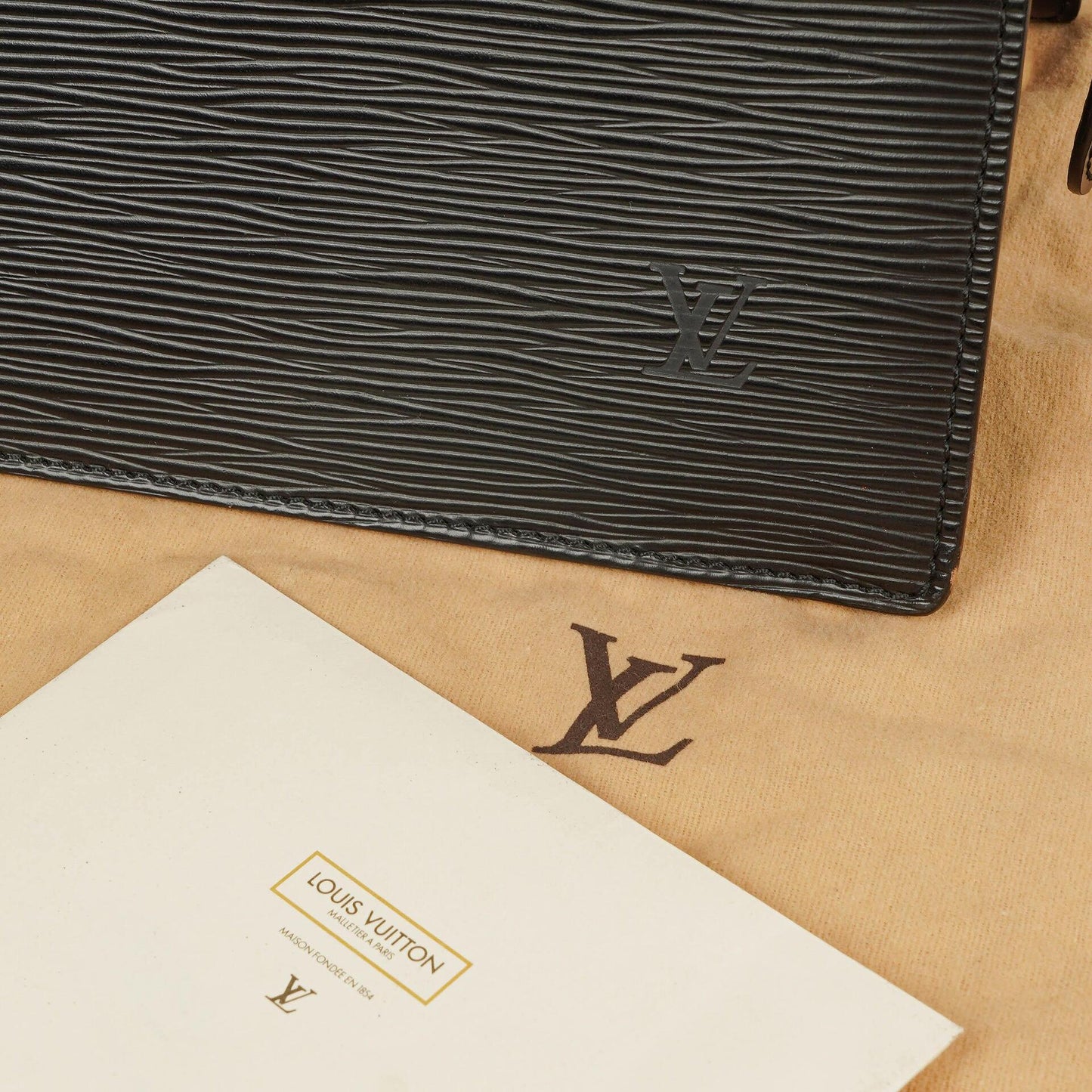 Louis Vuitton Triangle Black EPI Leather Handbag