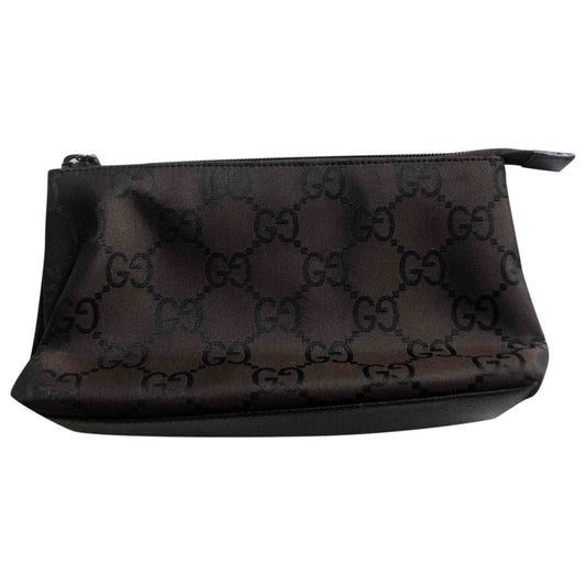 Gucci brown cloth clutch bag