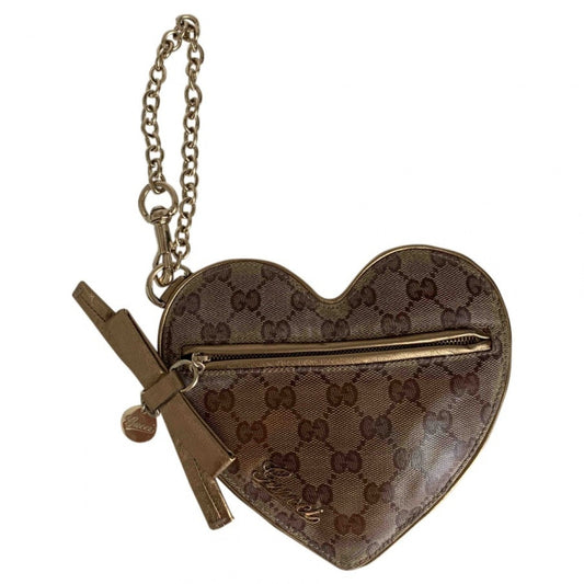 Gucci gold cloth clutch bag