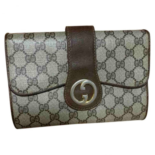 Gucci brown cloth clutch bag