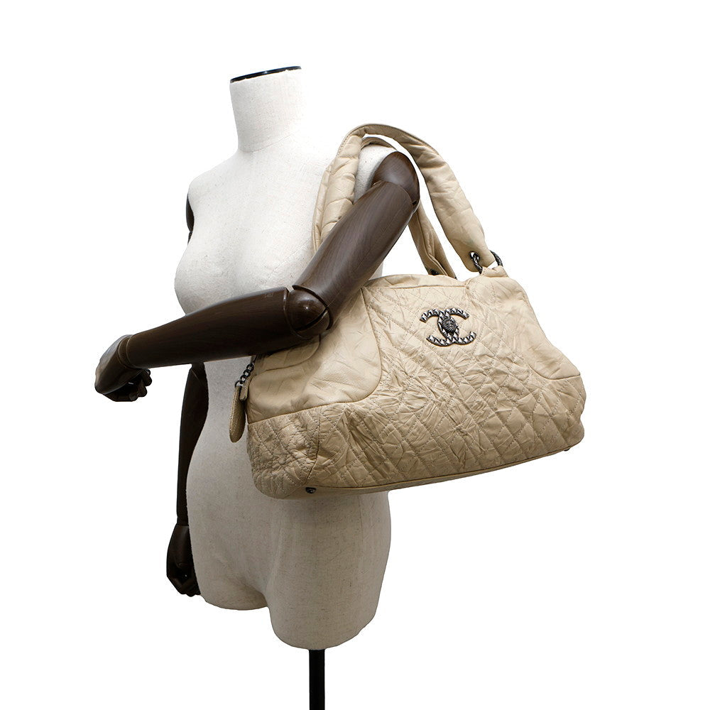 CHANEL CC Logo Travel Bag Beige Leather