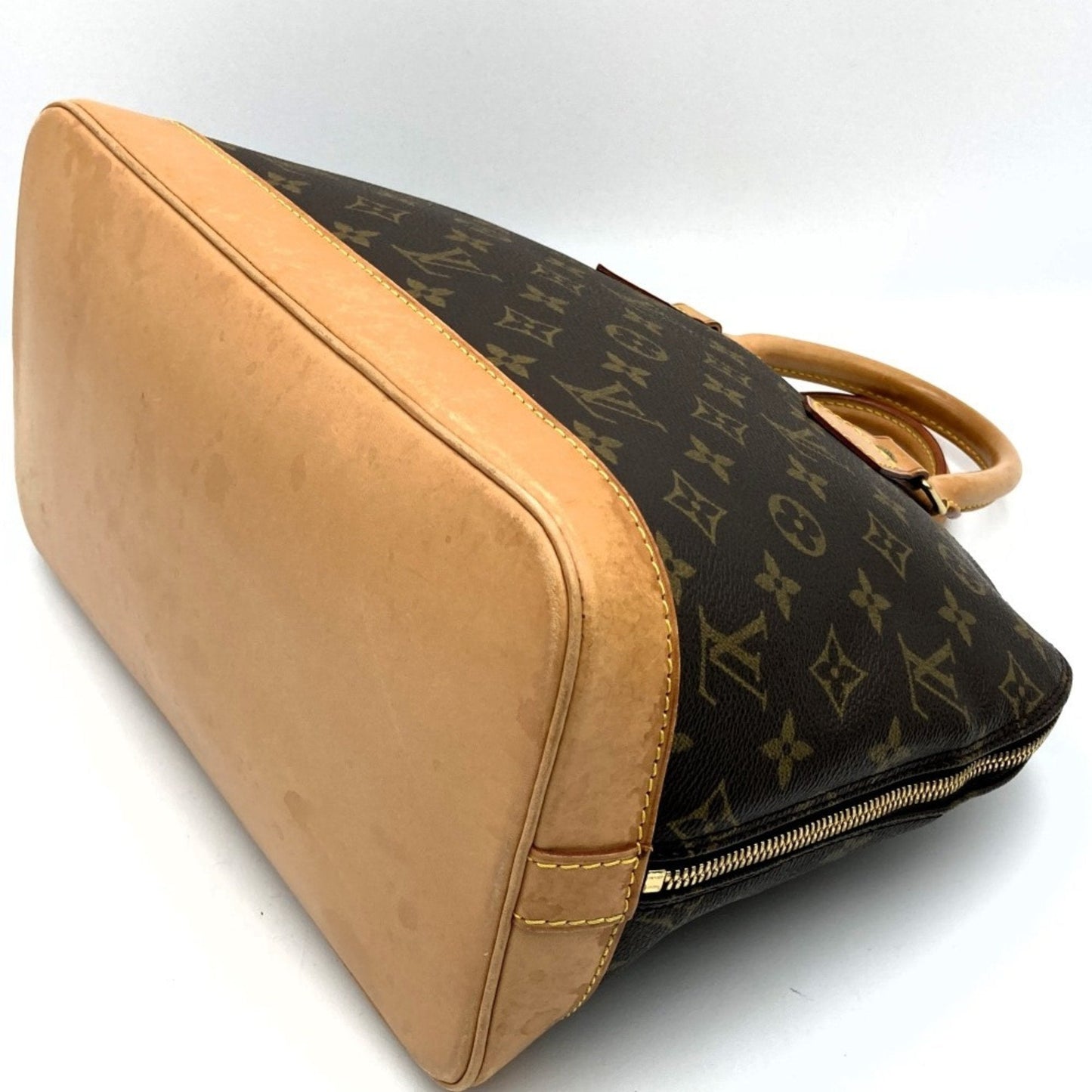 LOUIS VUITTON Alma Handbag