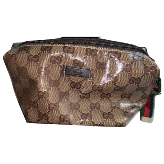 Gucci brown cloth clutch bag