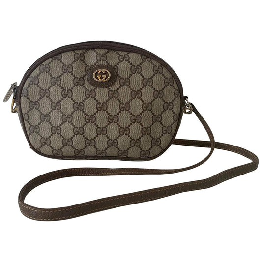 Gucci brown cloth clutch bag
