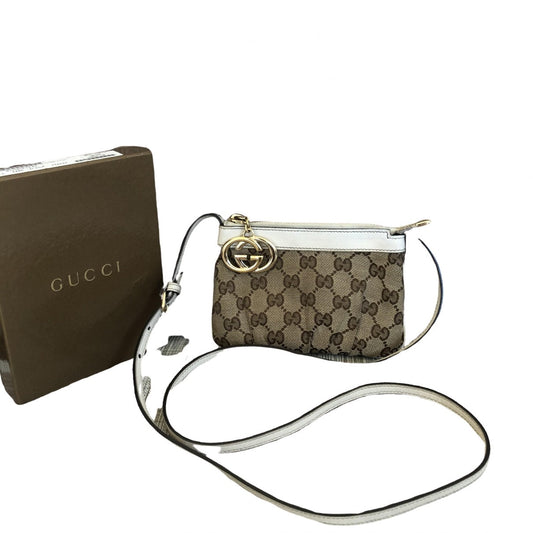 Gucci beige cloth clutch bag