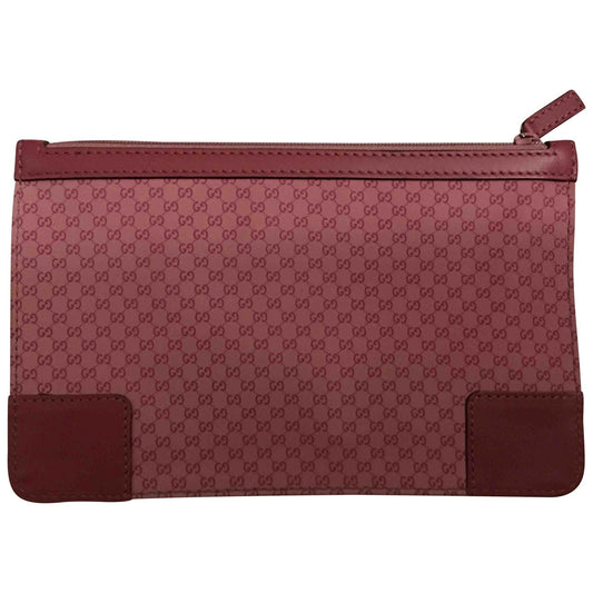 Gucci pink cloth clutch bag