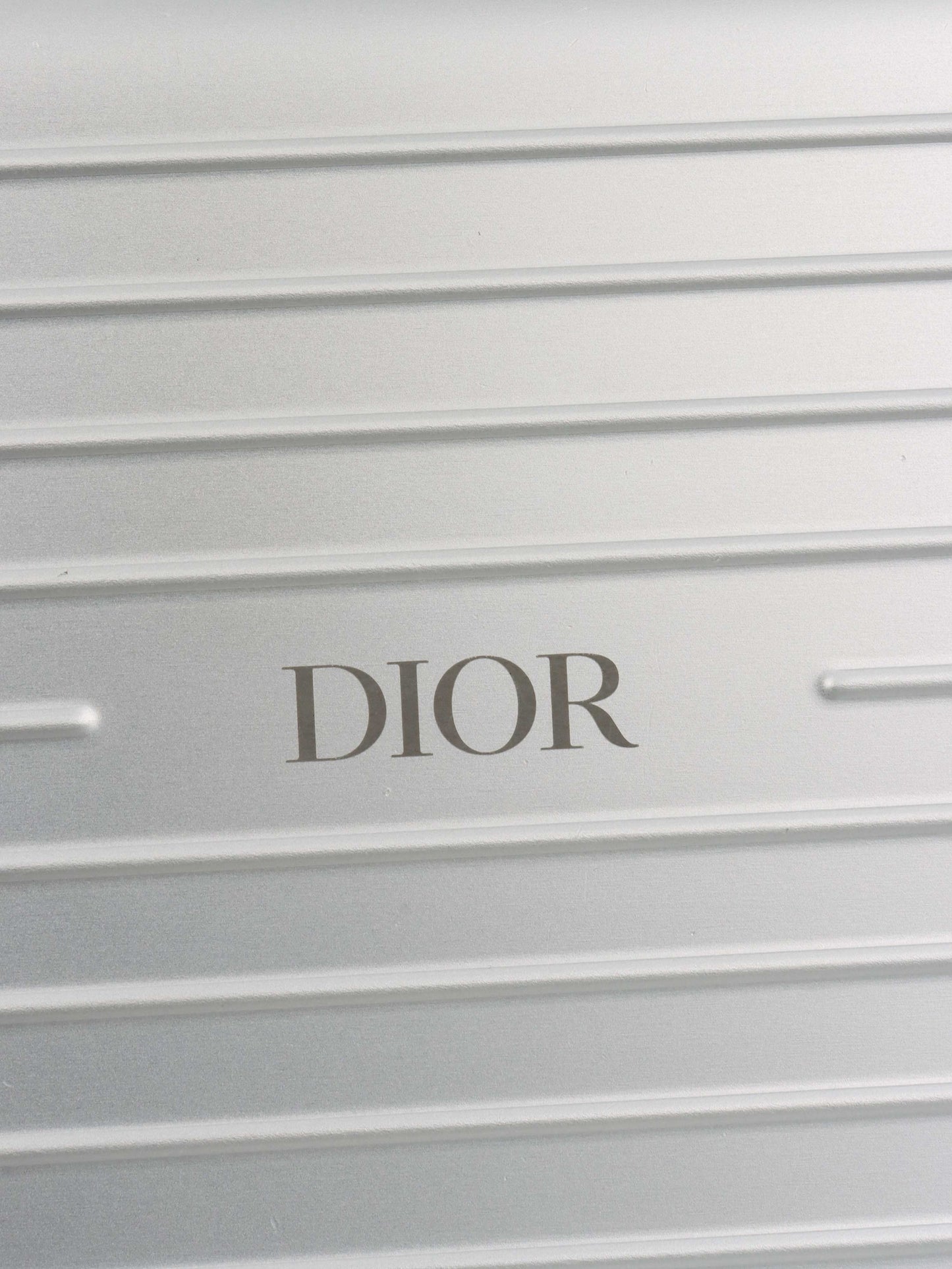 Dior x RIMOWA Silver Personal Clutch Case.