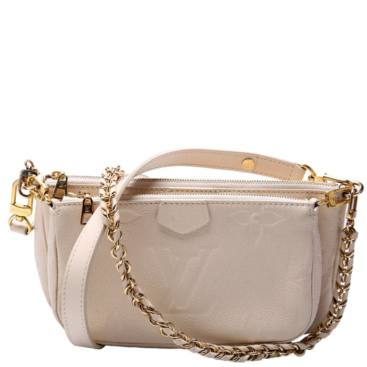 Louis Vuitton Multi Pochette Empreinte Cream
