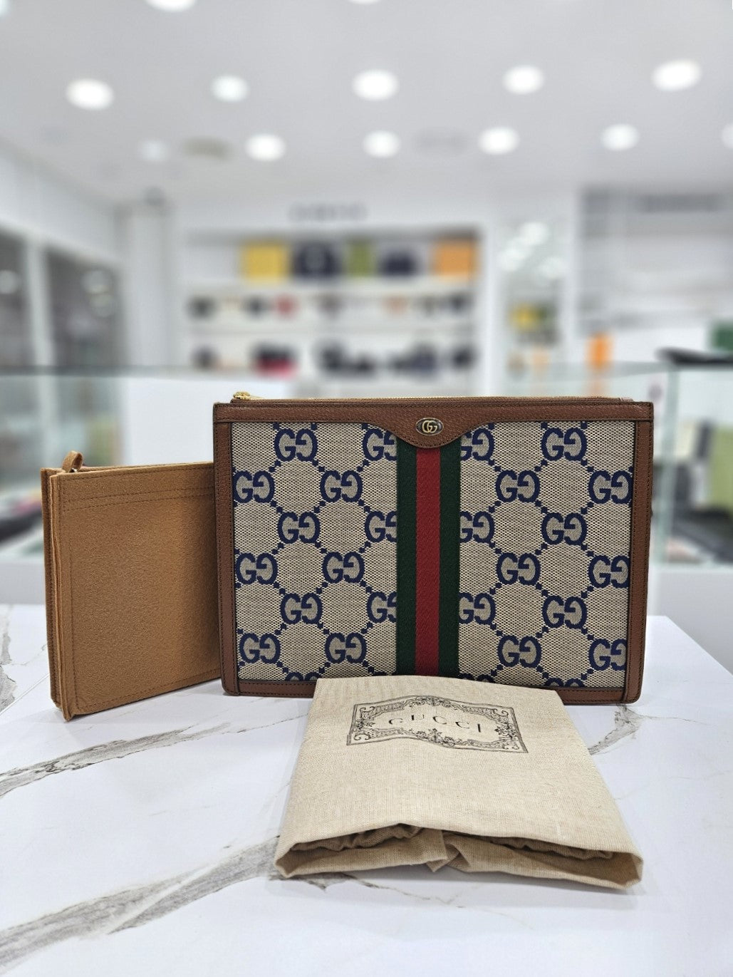 Gucci Leather Canvas Clutch