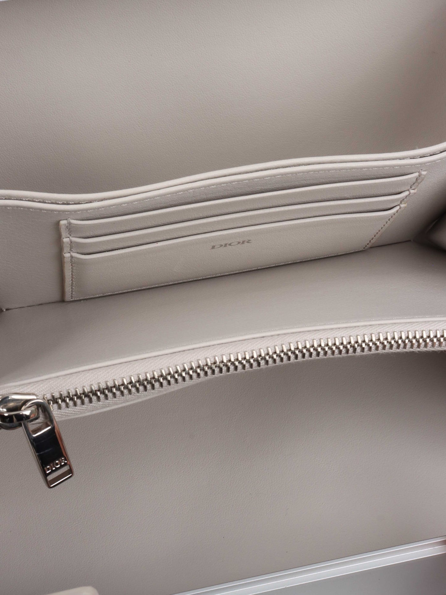 Dior x RIMOWA Silver Personal Clutch Case.