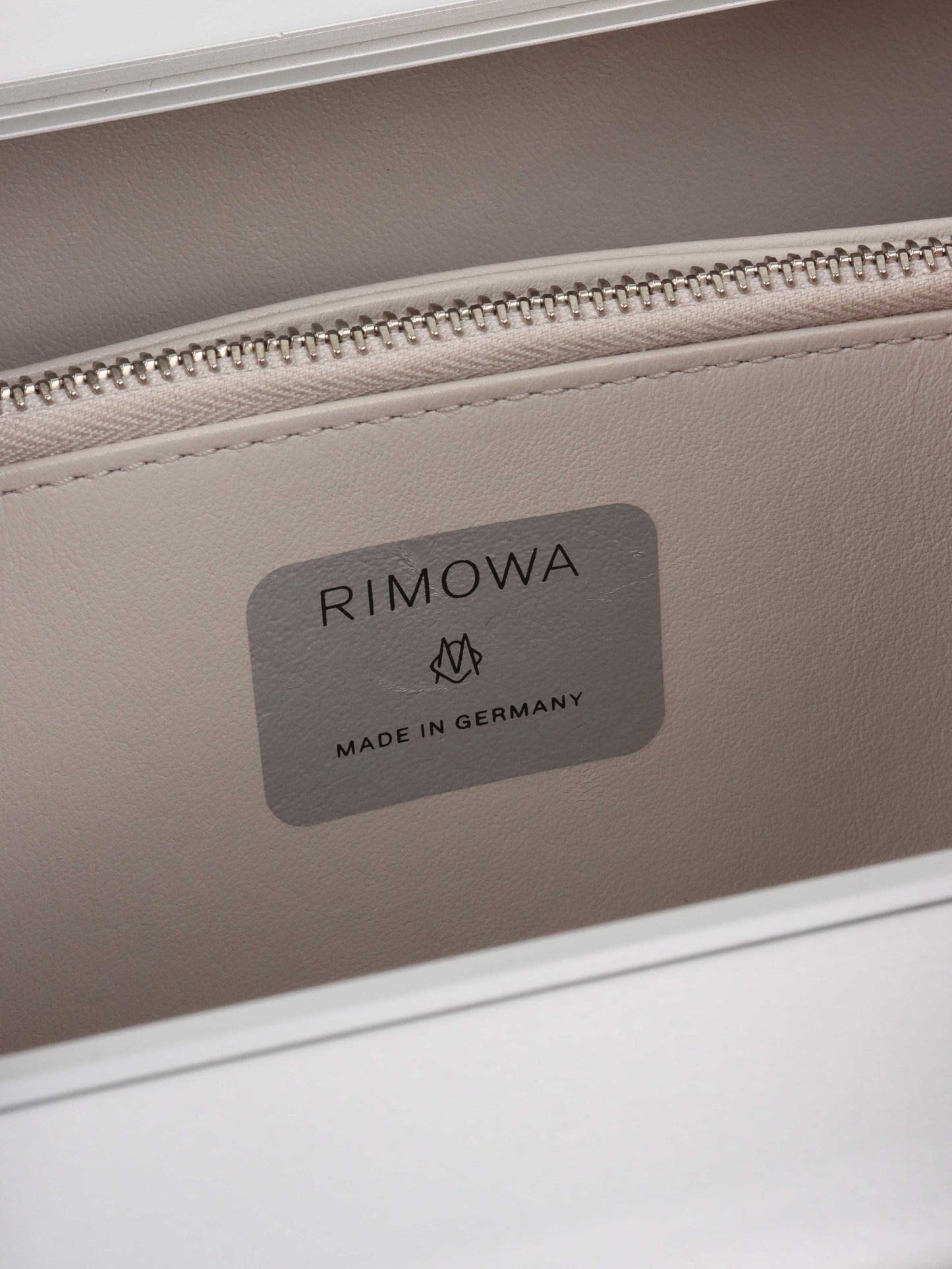 Dior x RIMOWA Silver Personal Clutch Case.