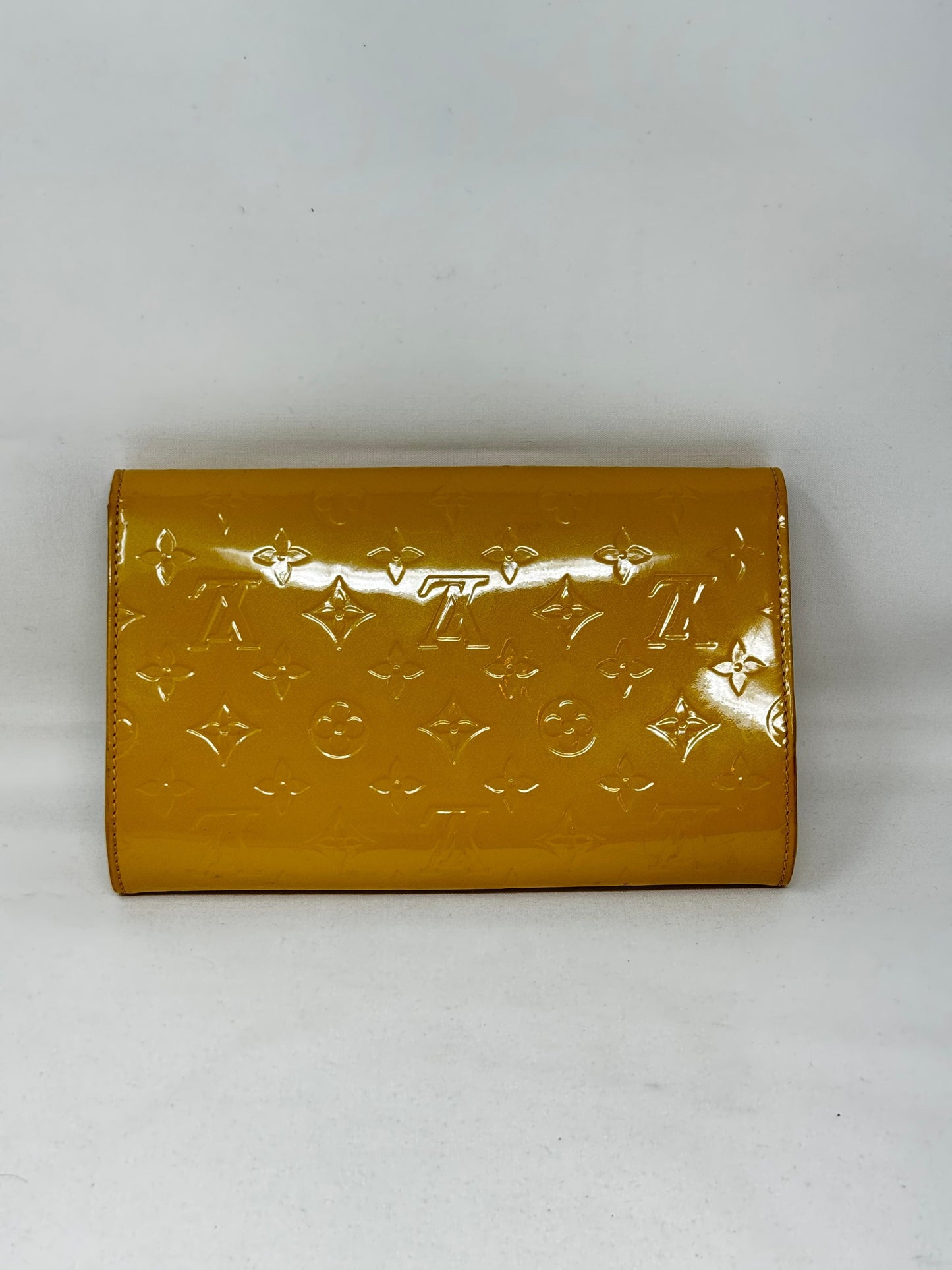 Rossmore leather clutch bag Louis Vuitton Yellow in Leather B21-62