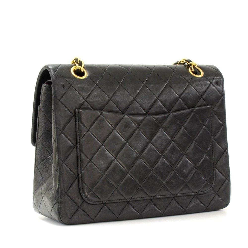CHANEL 2.55 10" Tall Double Flap Black Quilted Leather Shoulder Bag