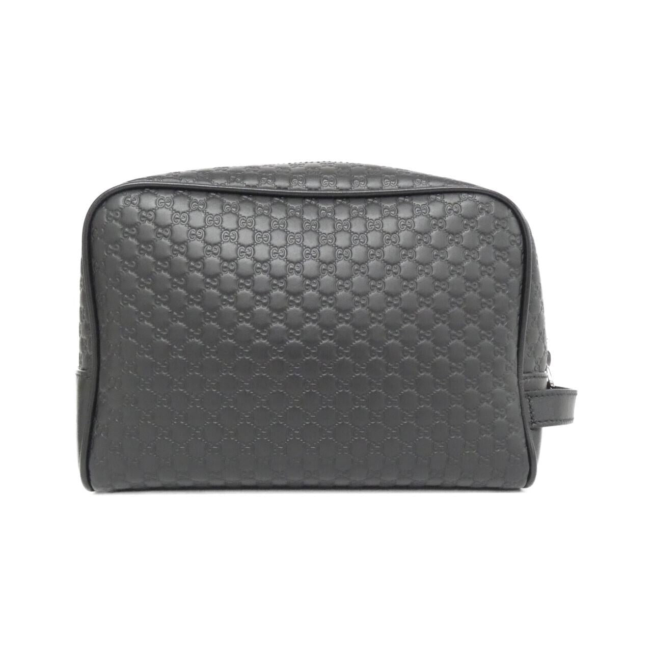 Gucci Microguccissima Leather Clutch Bag