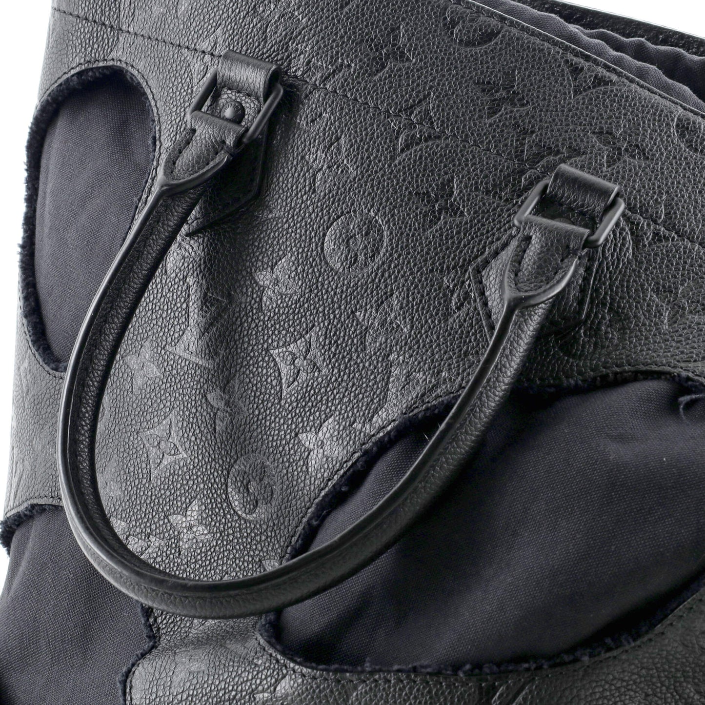 Louis Vuitton Rei Kawakubo Bag with Holes Monogram Empreinte Leather MM