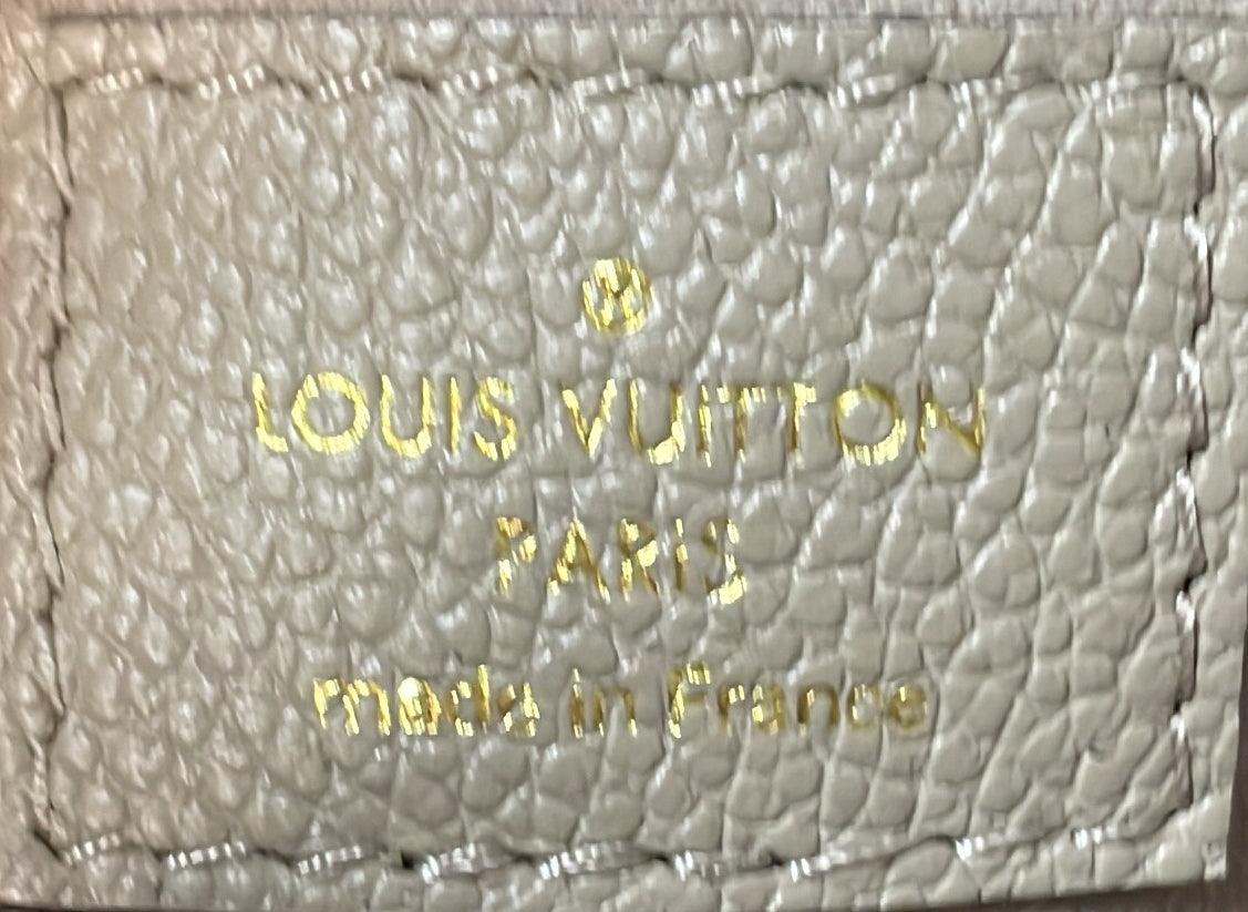 Louis Vuitton Favorite NM Handbag Bicolor Monogram Empreinte Giant