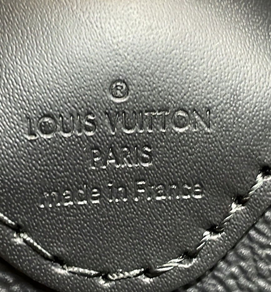 Louis Vuitton Horizon Clutch Monogram Eclipse Canvas