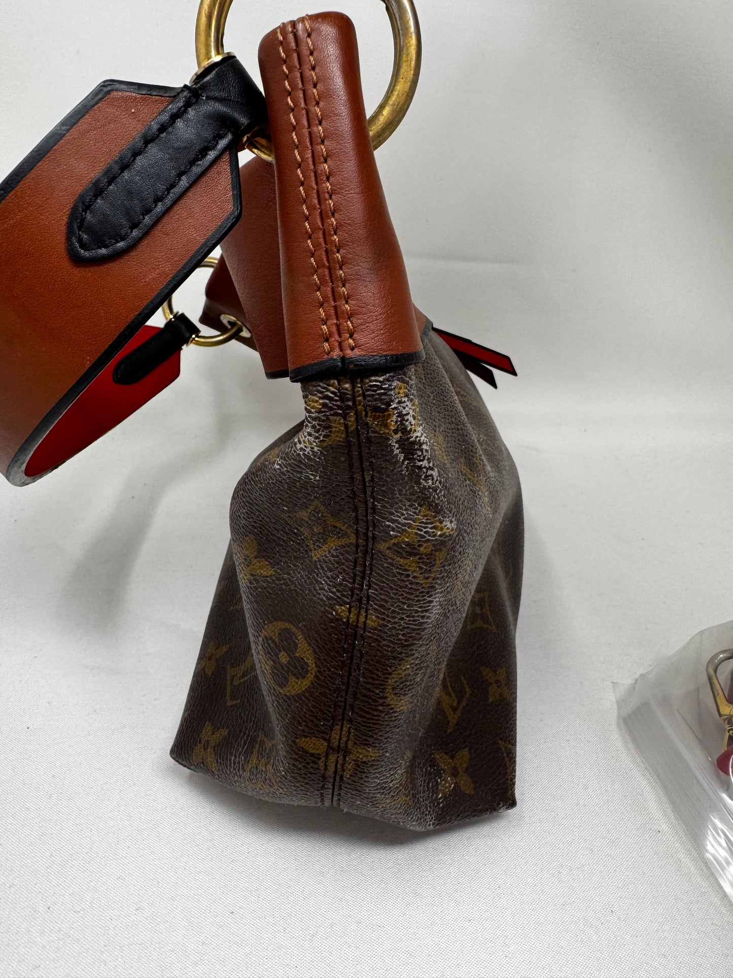 LOUIS VUITTON Monogram Tuileries Besace Caramel Rouge B20-80