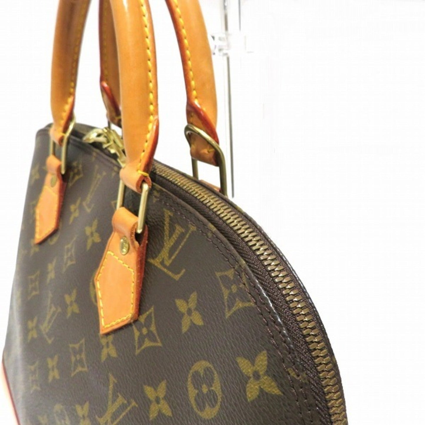 Louis Vuitton Brown Canvas Alma handbag bag