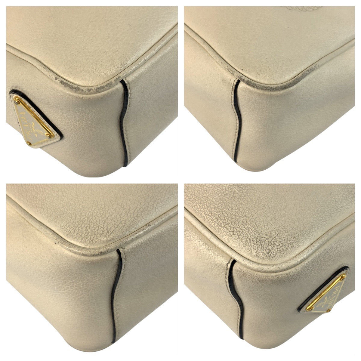 Prada Logo Embossed Leather Shoulder Bag