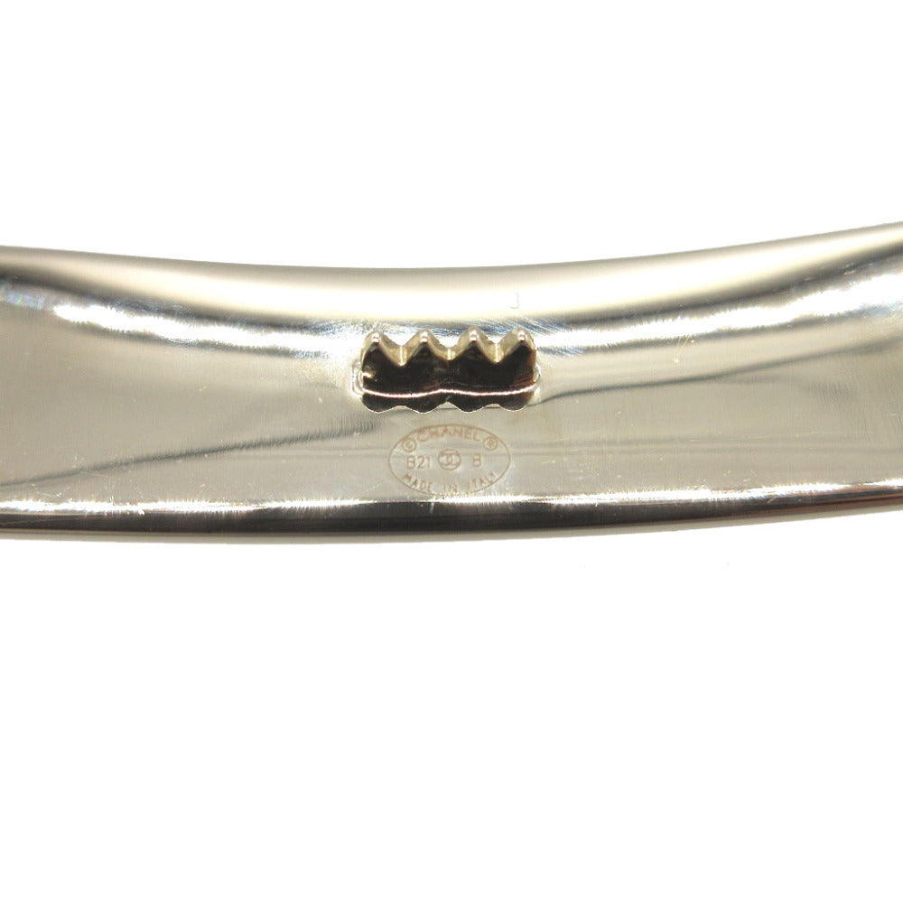 CHANEL Valletta metal gold logo plate hair accessory Women