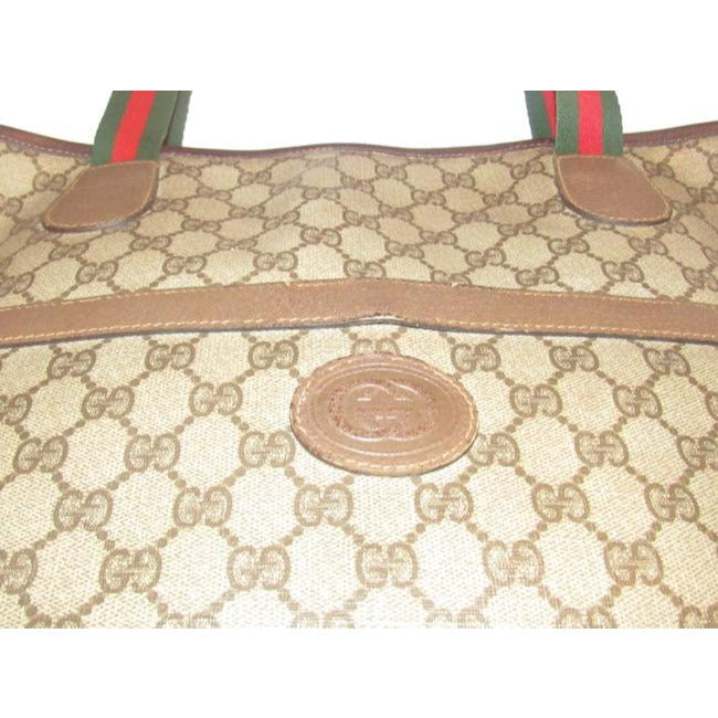 Gucci Vintage Leather And Large G Logo Print Coated Canvas In Shades Of Brown