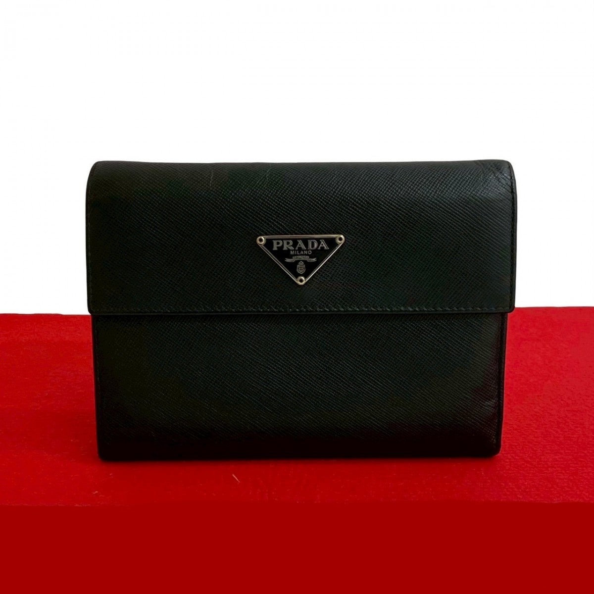 PRADA Tri-fold wallet leather black Triangle Logo Metal Women