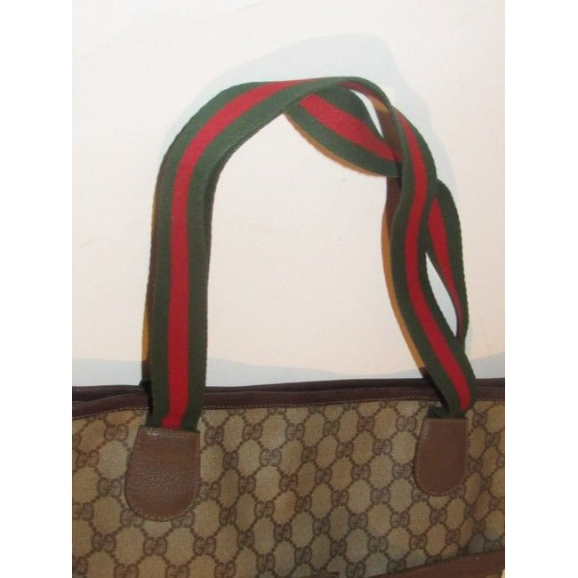 Gucci Vintage Leather And Large G Logo Print Coated Canvas In Shades Of Brown