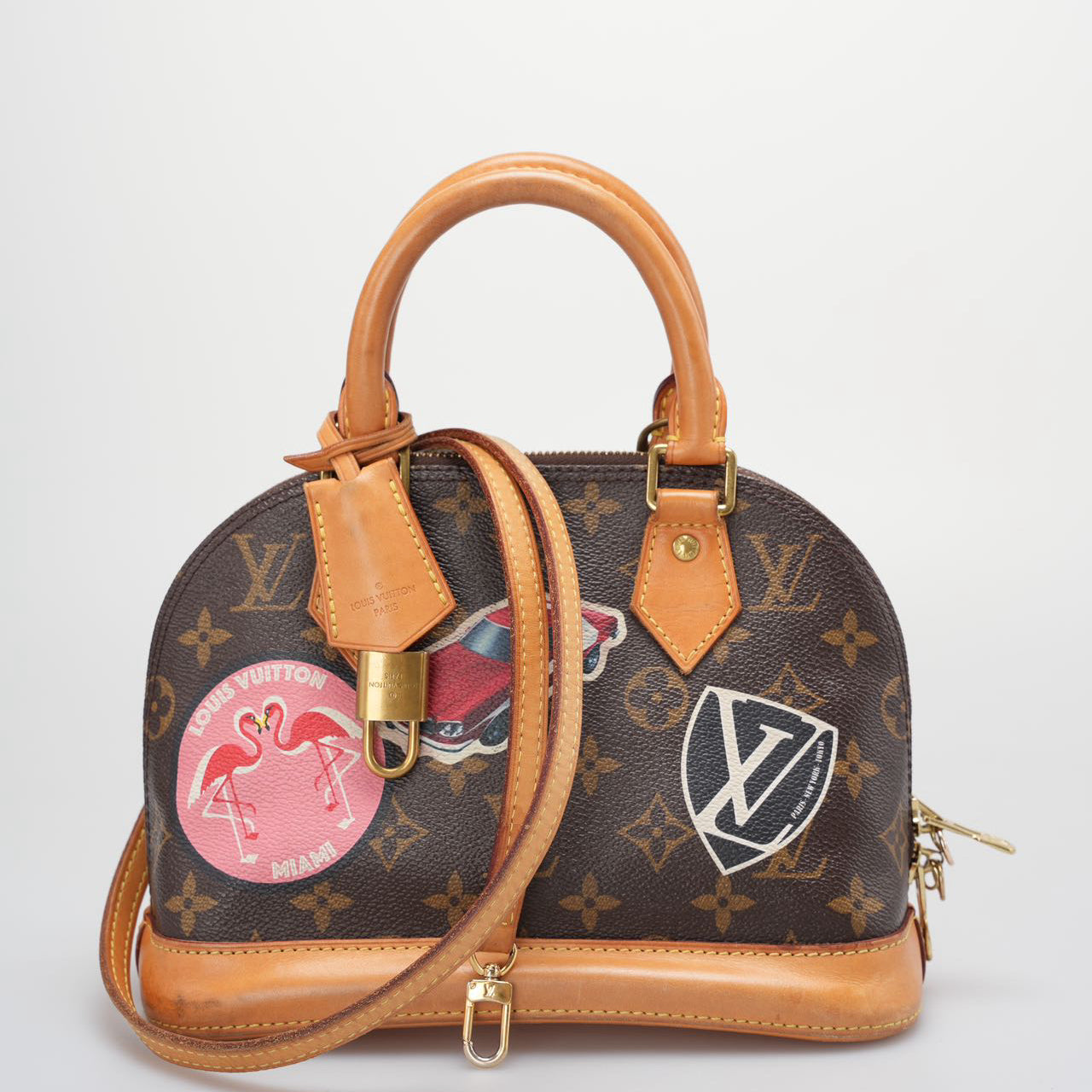 Louis Vuitton Monogram World Tour Alma BB Satchel Bag