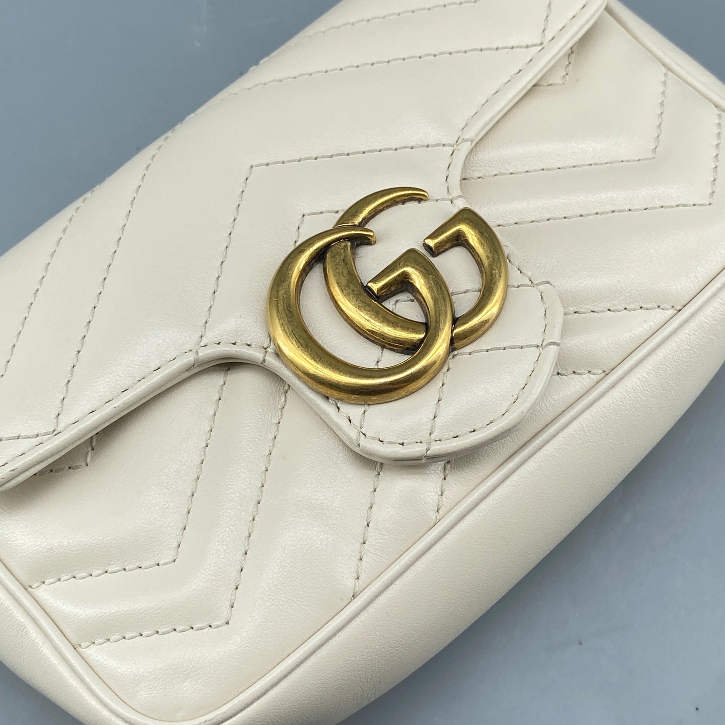 Gucci Cream GG Supreme Chevron Quilted Leather Marmont Mini Flap Chain Bag