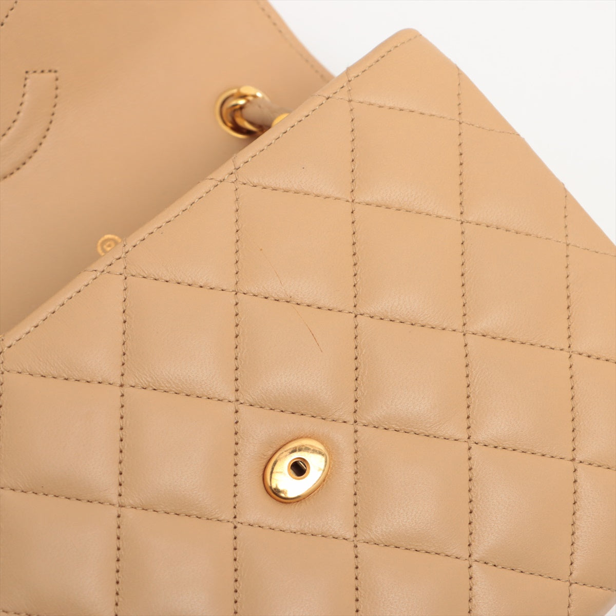 ITEM 17 - Chanel  Mini CC Beige Single Flap Bag