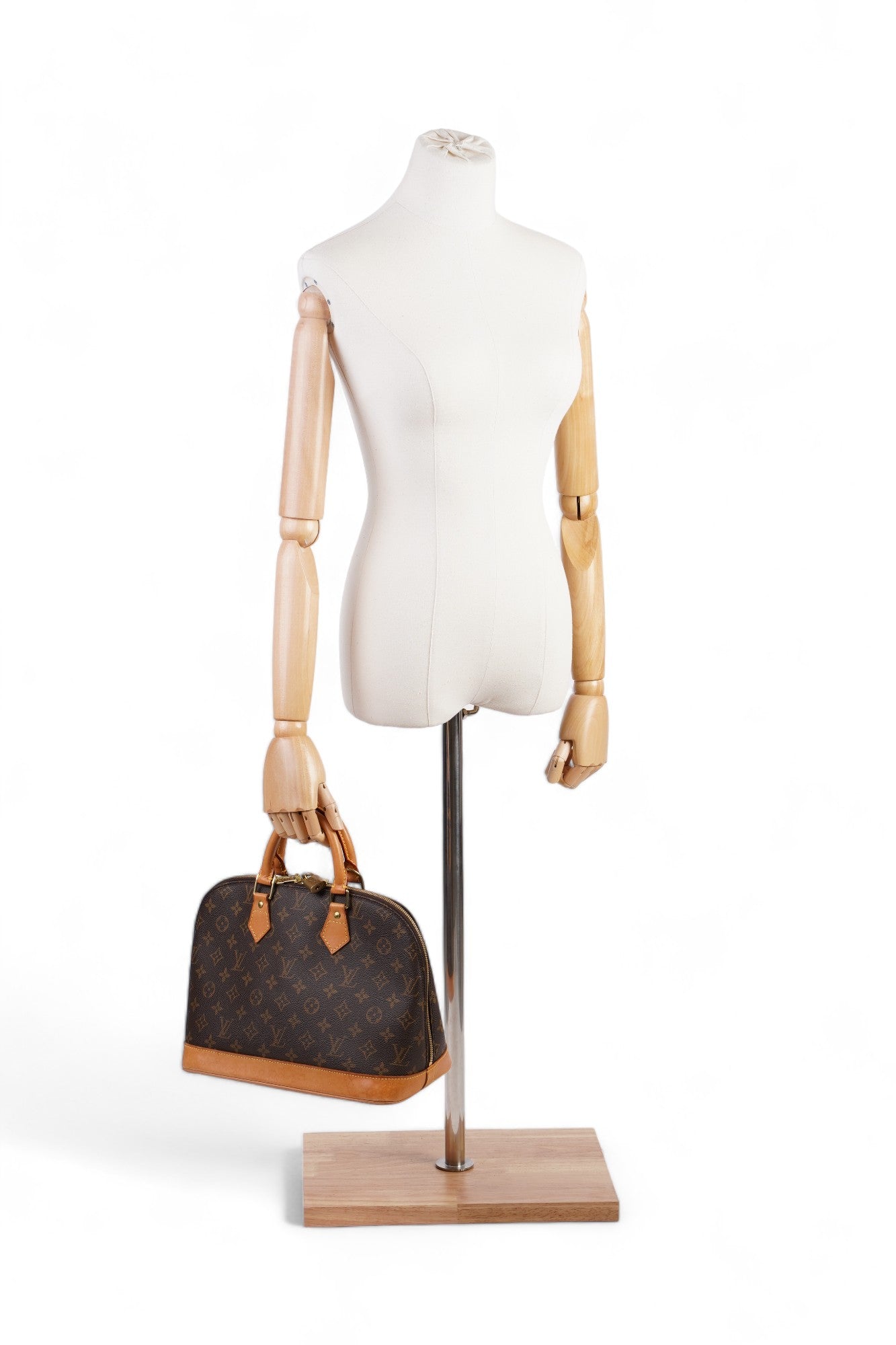 Louis Vuitton Alma Monogram Coated Canvas PM