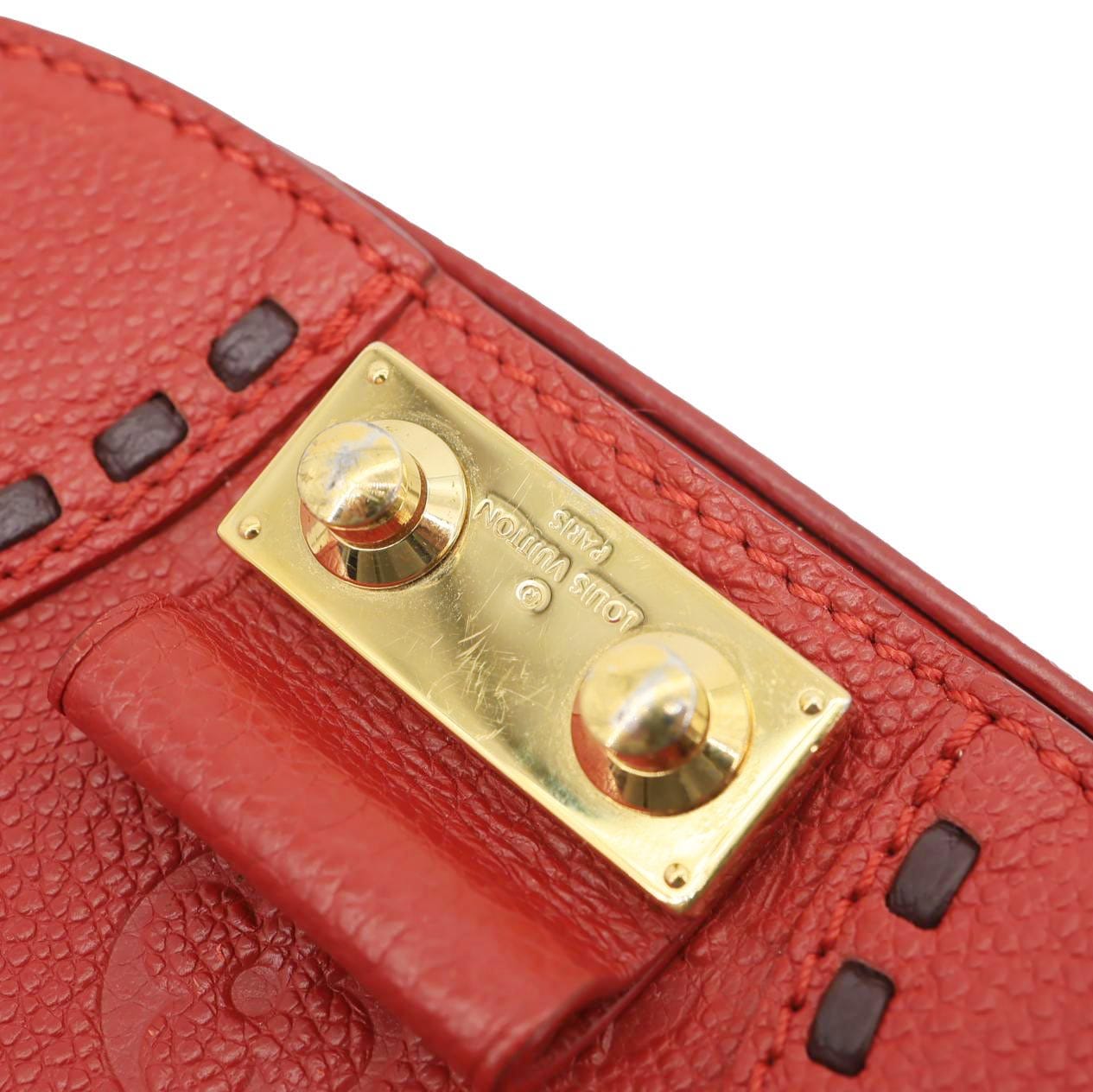LOUIS VUITTON Junot Monogram Empreinte Leather Shoulder Bag Cherry