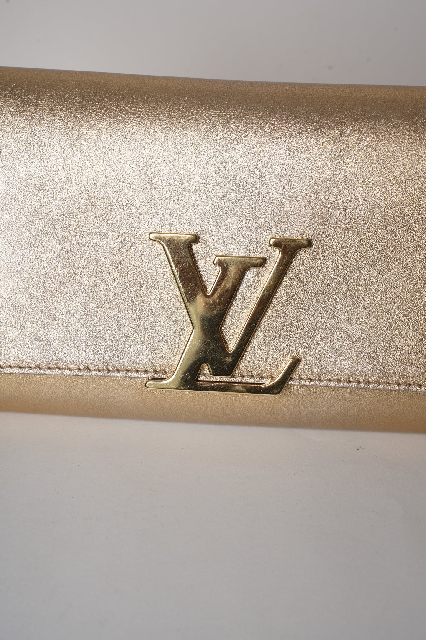 Louis Vuitton Calfskin Neo Louise Clutch
