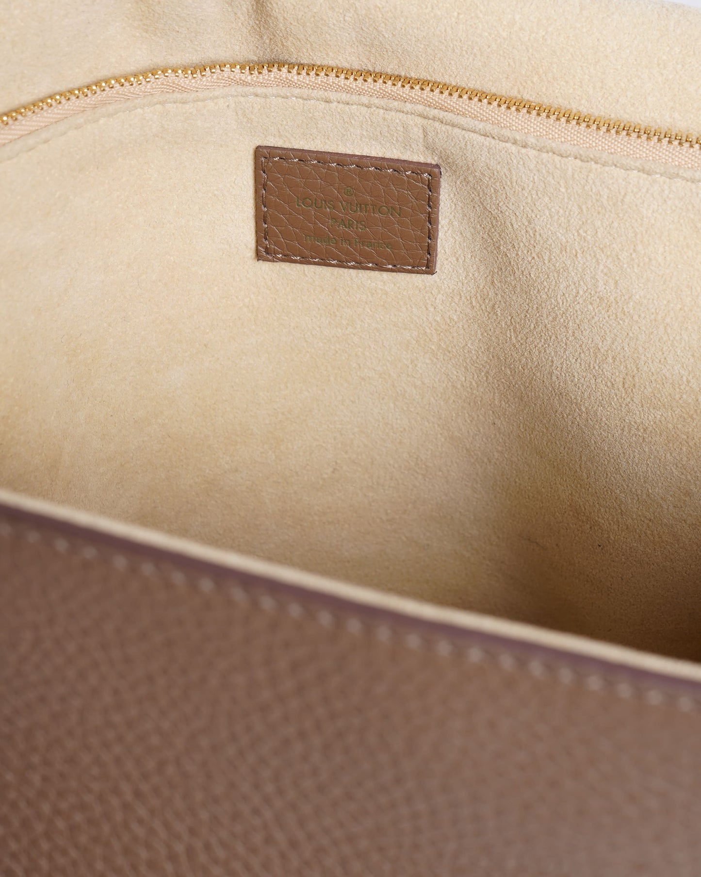 Louis Vuitton Volta Top Handle Bag In Beige