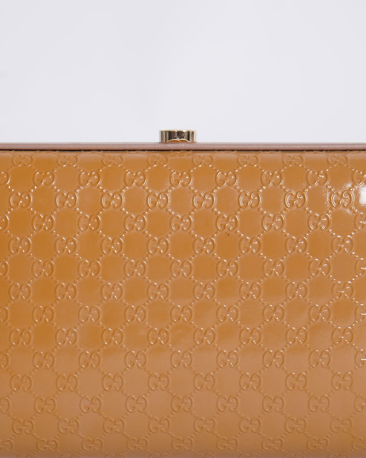 Gucci Monogram Leather Clutch