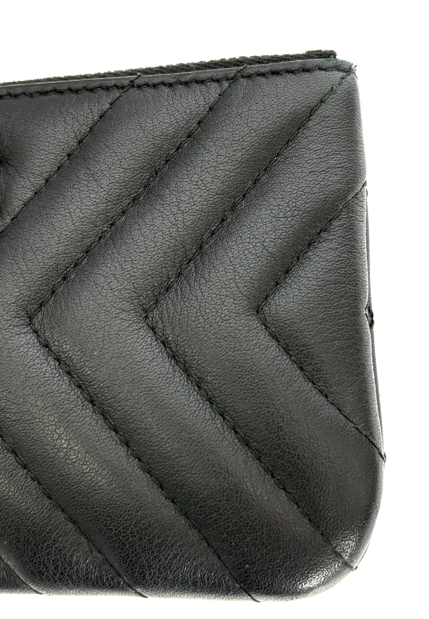CHANEL LEATHER CHEVRON MINI TASSEL ZIP POUCH