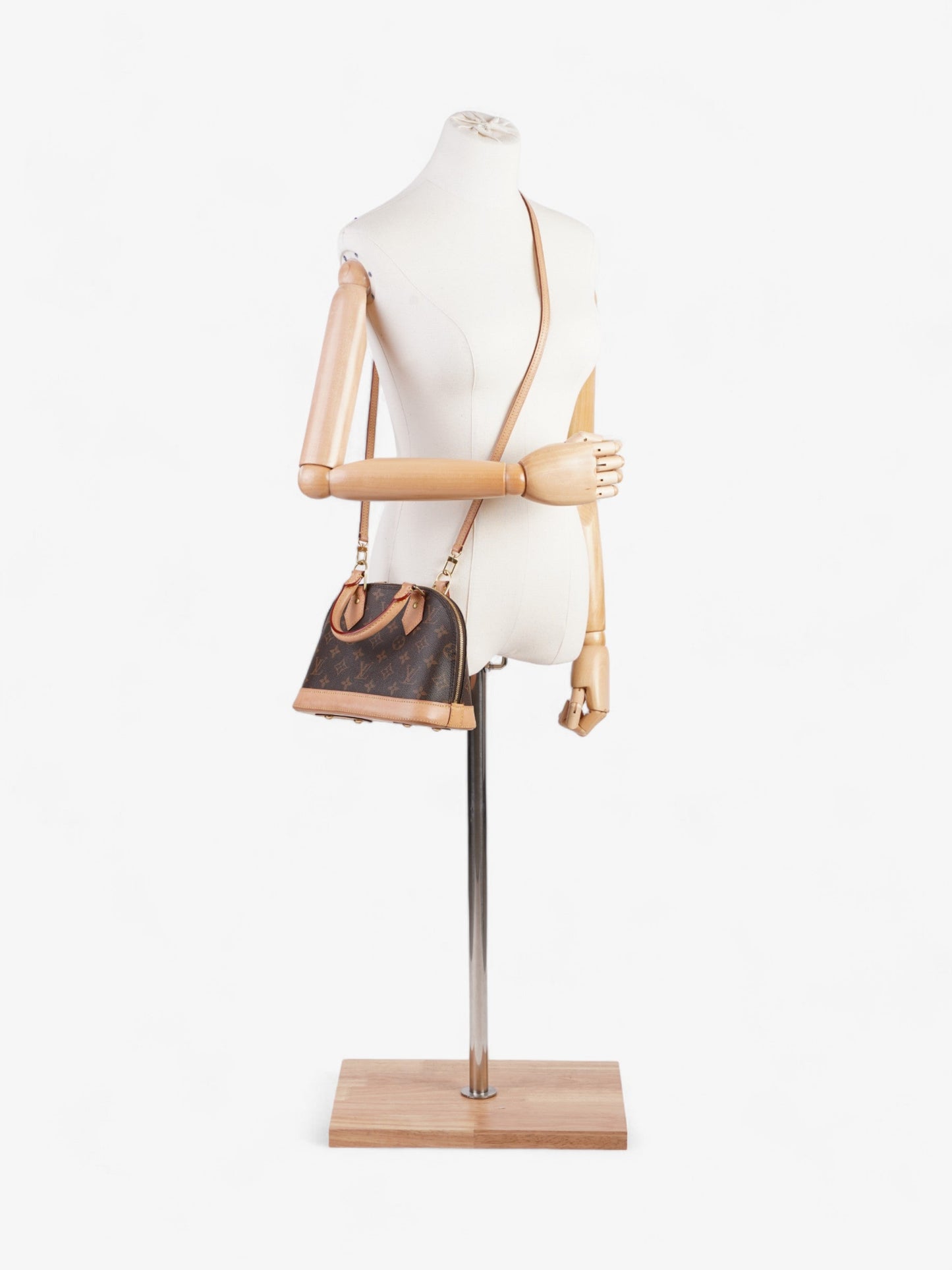 Louis Vuitton Alma Monogram Coated Canvas BB