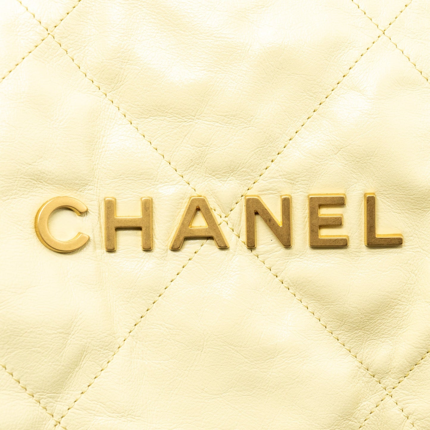 Chanel 23P Small 22 Backpack Shiny Calfskin Light Yellow Brushed (Microchip)