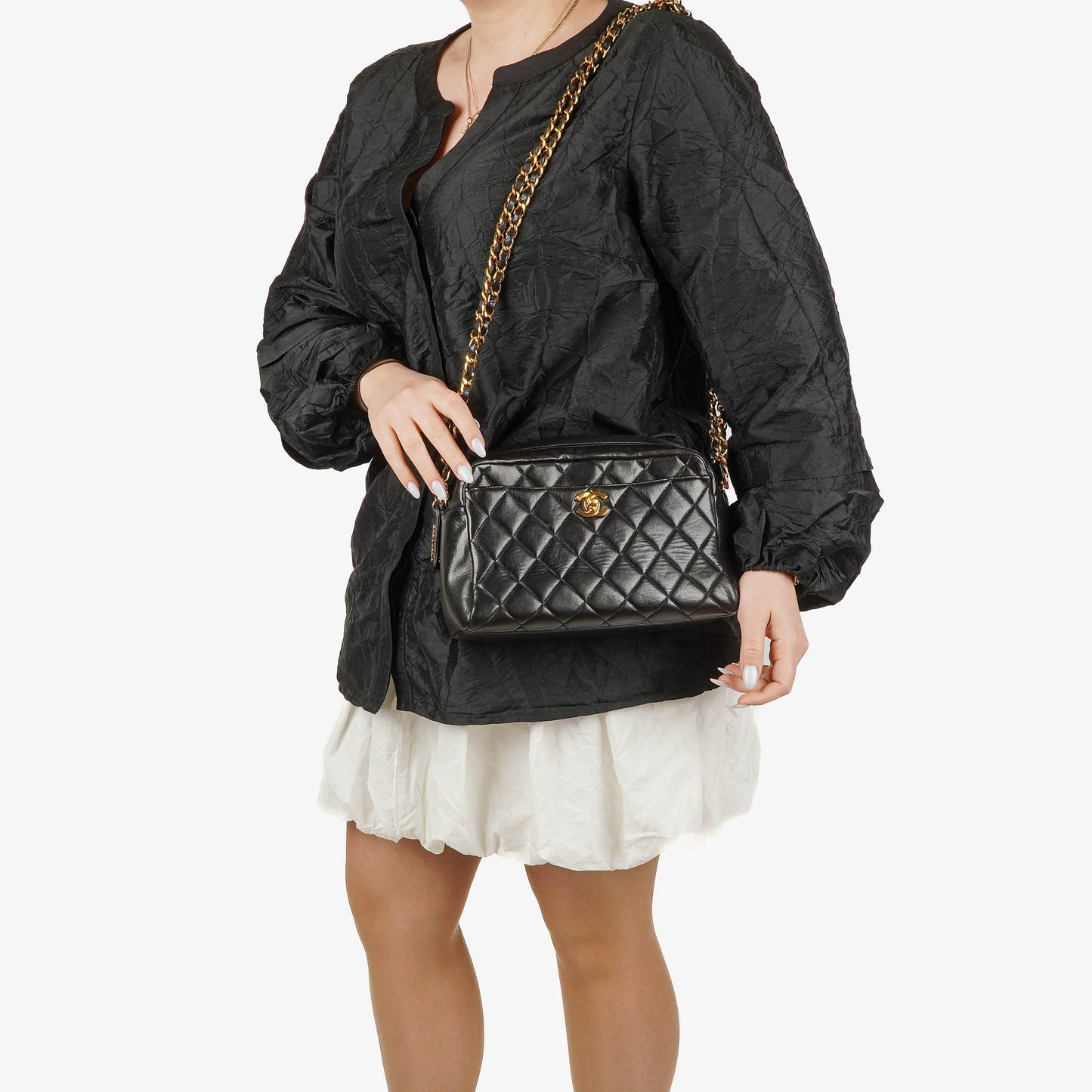 Chanel  Front Pocket Camera Bag Black Quilted Leather With 24K Gold-Plated Hardware